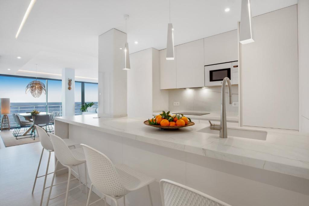 Kuchnia lub aneks kuchenny w obiekcie Exclusivo apartamento con increíbles vistas al mar