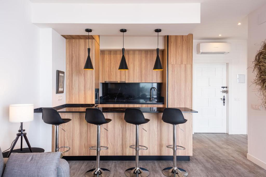 TV a/nebo společenská místnost v ubytování Fabuloso apartamento con increíbles vistas al mar