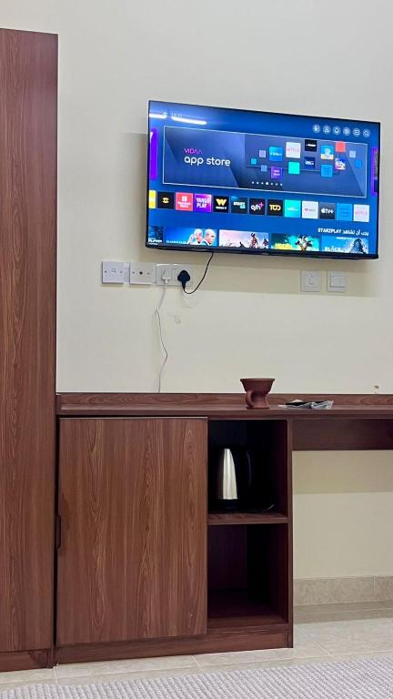 TV a/nebo společenská místnost v ubytování Sunset hotel