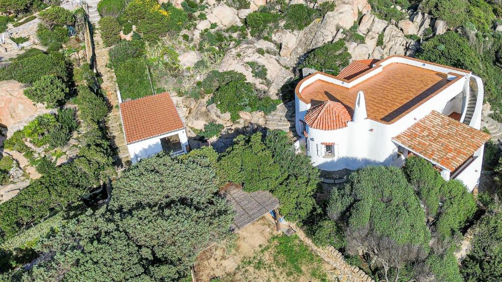 an overhead view of a house on a mountain at Villa Adea in Santa Teresa Gallura
