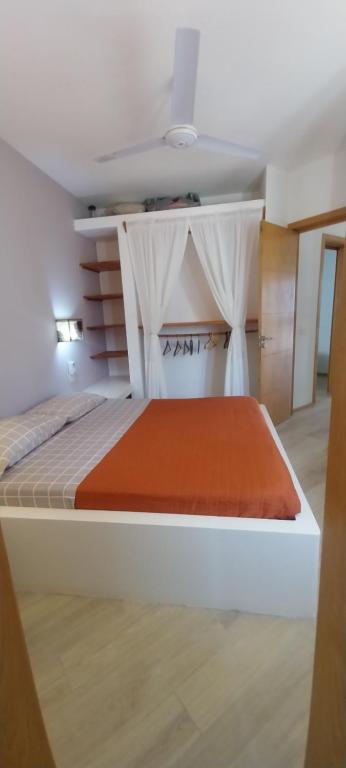 Postel nebo postele na pokoji v ubytování Cala da Lua apartments