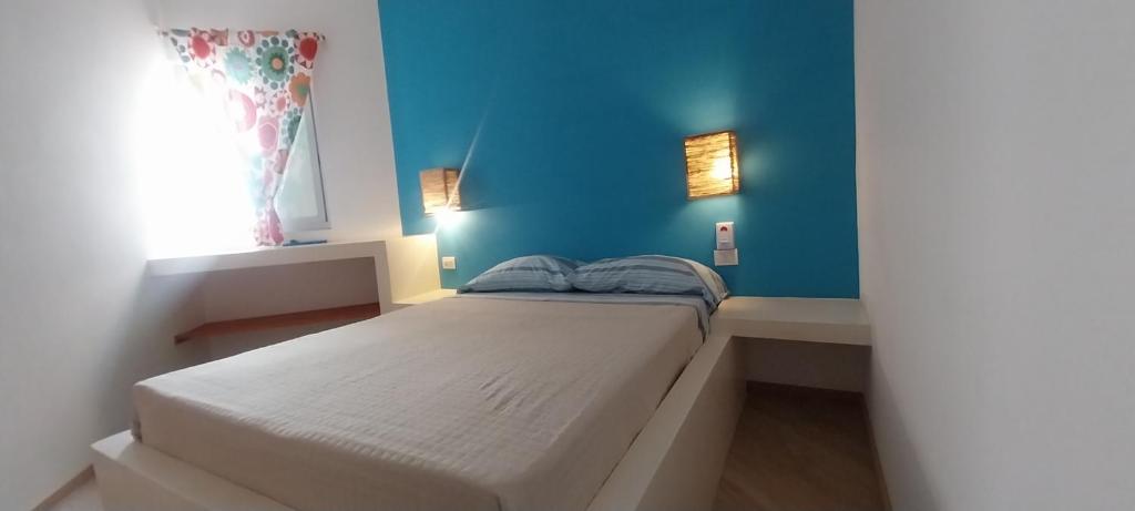 Postel nebo postele na pokoji v ubytování Cala da Lua apartments