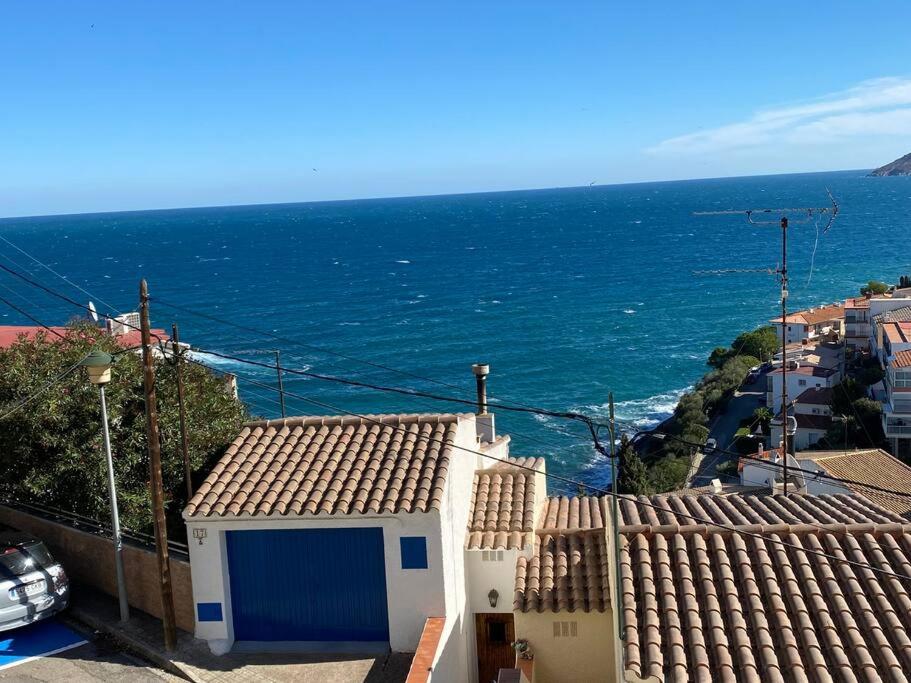 a view of the ocean from a building at El Valles Apartment sea view in Llança