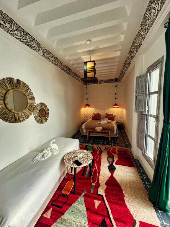 Postel nebo postele na pokoji v ubytování Riad dar darcom