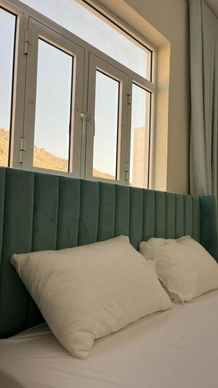Postel nebo postele na pokoji v ubytování Sunset hotel