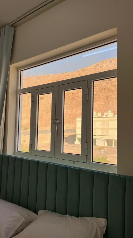 Postel nebo postele na pokoji v ubytování Sunset hotel