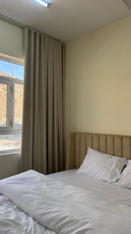 Postel nebo postele na pokoji v ubytování Sunset hotel