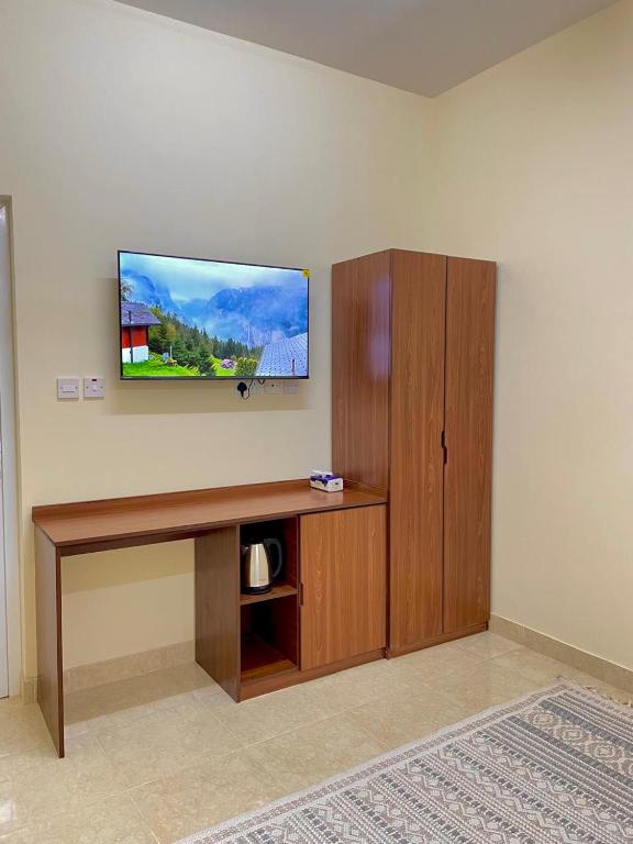 TV a/nebo společenská místnost v ubytování Sunset hotel