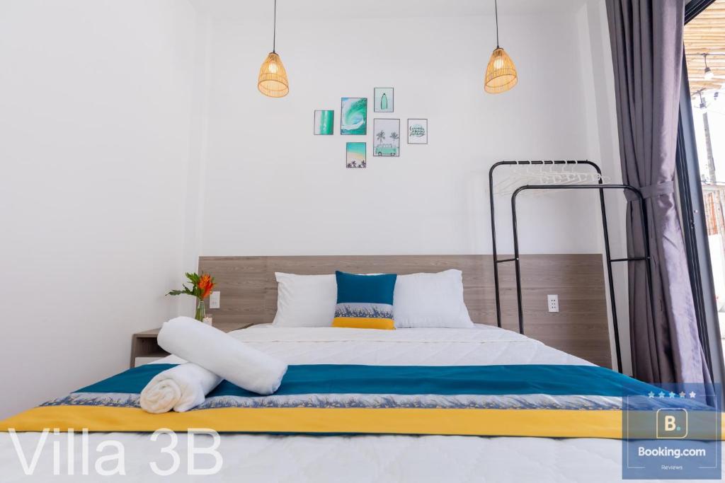 Postel nebo postele na pokoji v ubytování 3B - Trệt Không Lầu - Phong Cách Đà Lạt