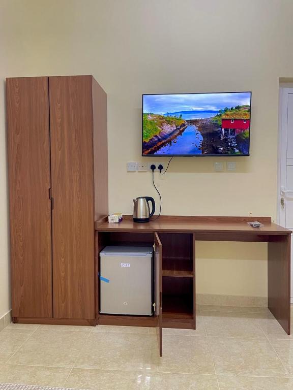 TV a/nebo společenská místnost v ubytování Sunset hotel