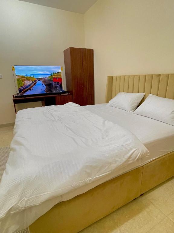 Postel nebo postele na pokoji v ubytování Sunset hotel