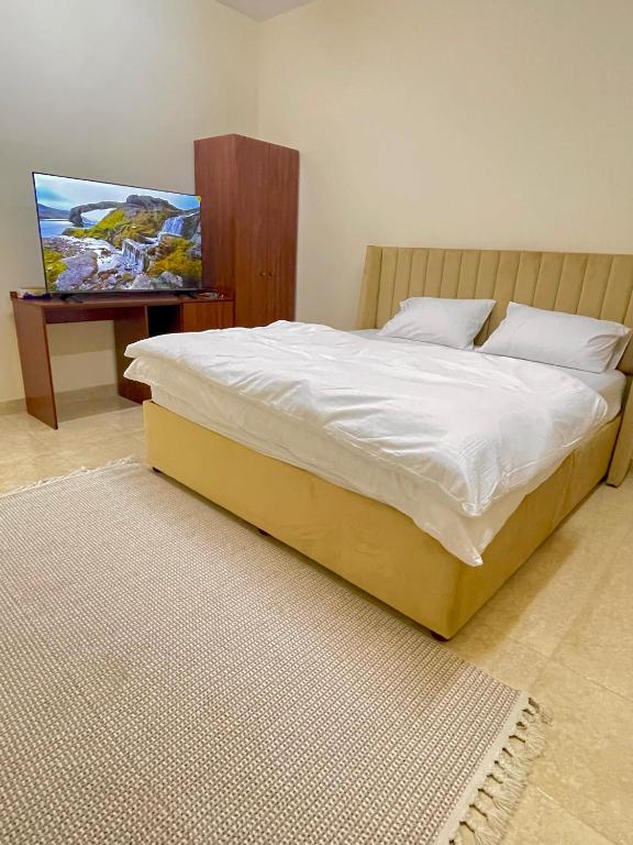 Postel nebo postele na pokoji v ubytování Sunset hotel