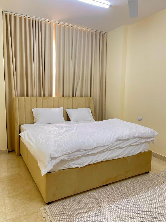 Postel nebo postele na pokoji v ubytování Sunset hotel