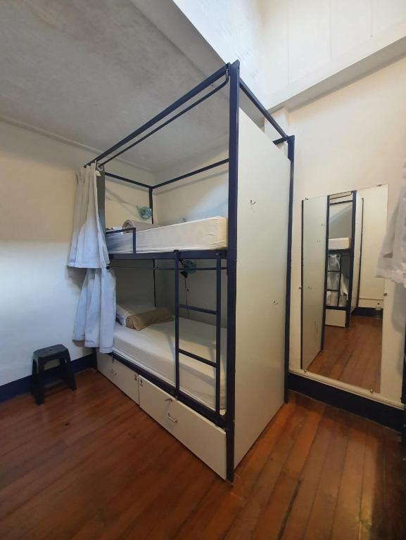 Postel nebo postele na pokoji v ubytování History Hostel