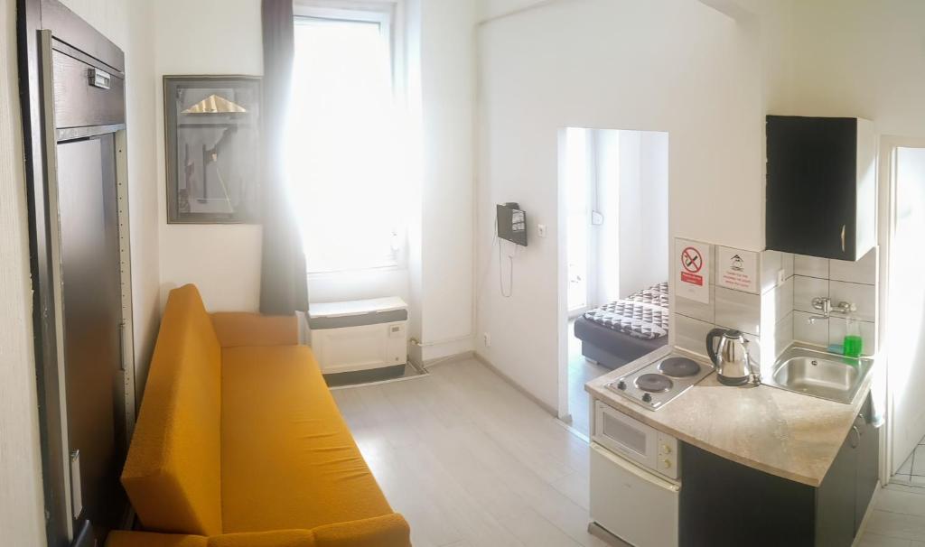 Kuchyňa alebo kuchynka v ubytovaní SparrOwl Apartments
