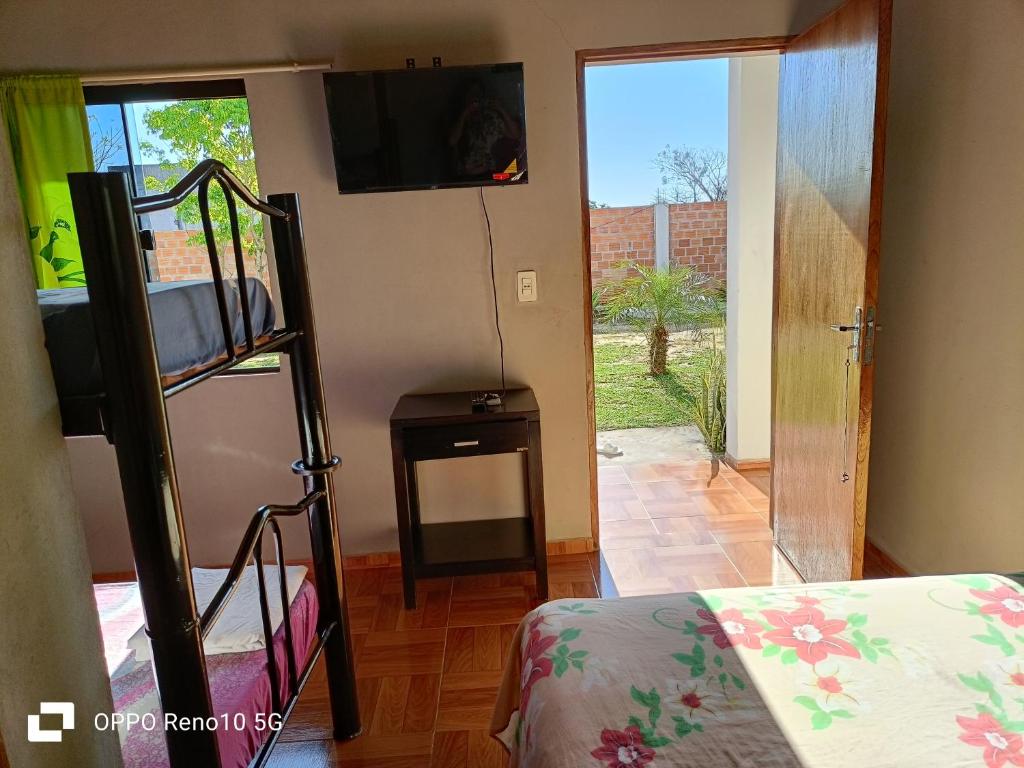 Ліжко або ліжка в номері Hospedaje San Juan del Paraná