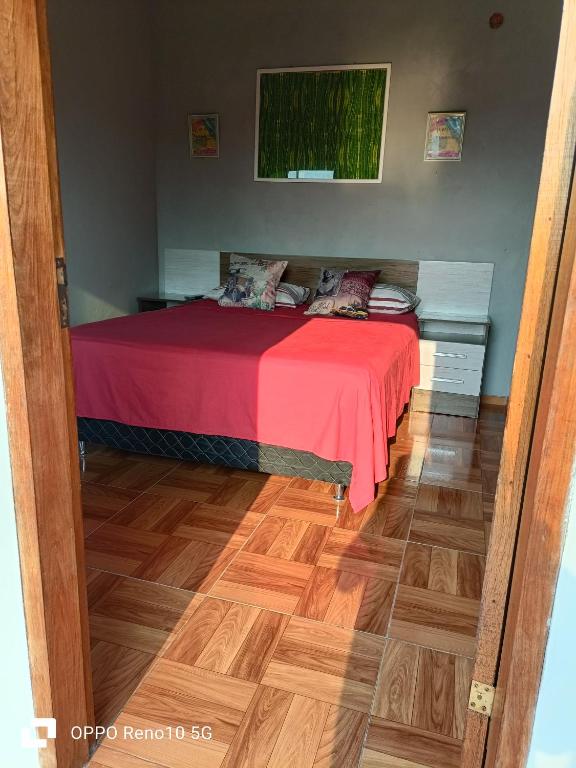 Ліжко або ліжка в номері Hospedaje San Juan del Paraná