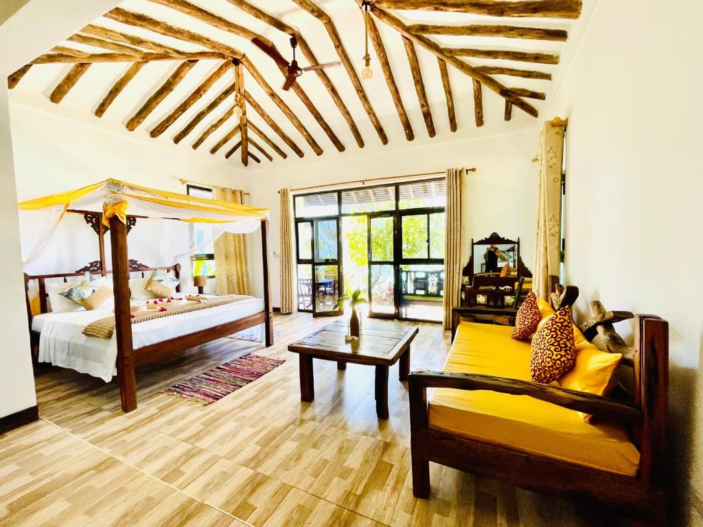 Postel nebo postele na pokoji v ubytování Z-Breeze Zanzibar