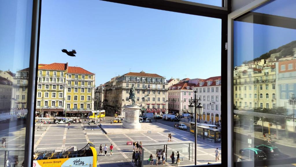 Nespecifikovaný výhled na destinaci Lisabon nebo výhled na město při pohledu z hostelu