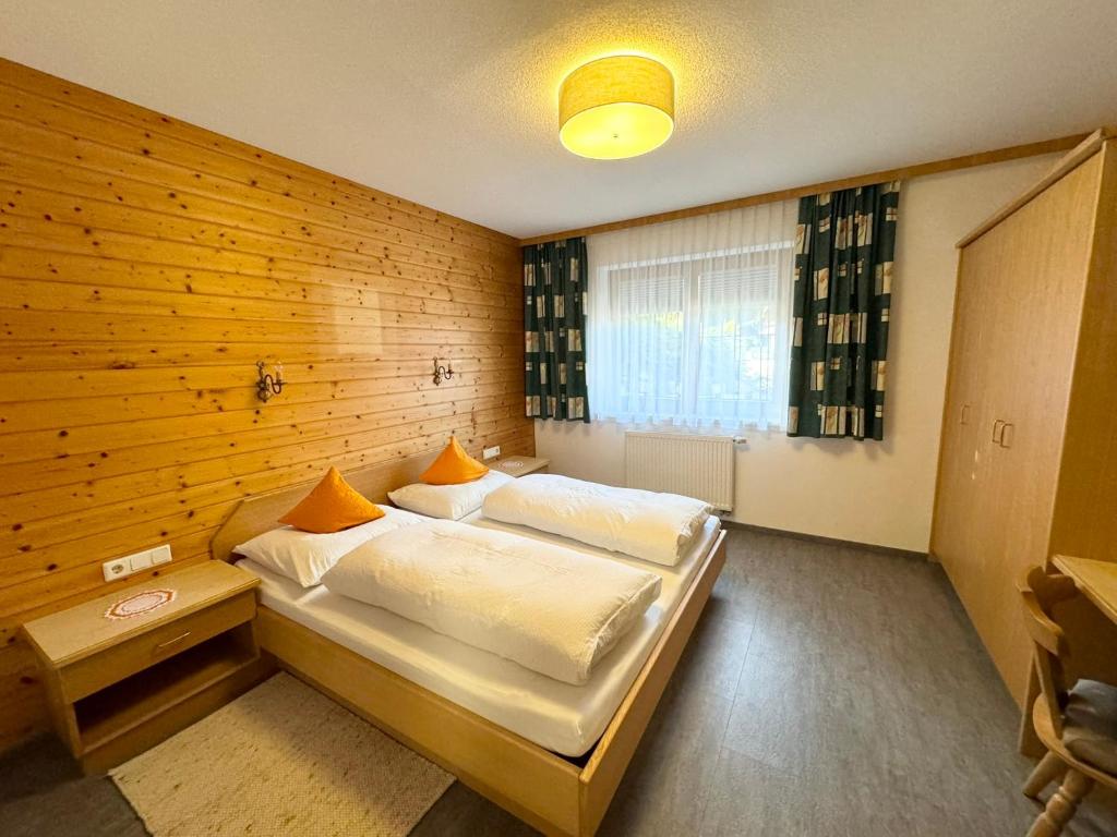 Postel nebo postele na pokoji v ubytování Am Dörfl