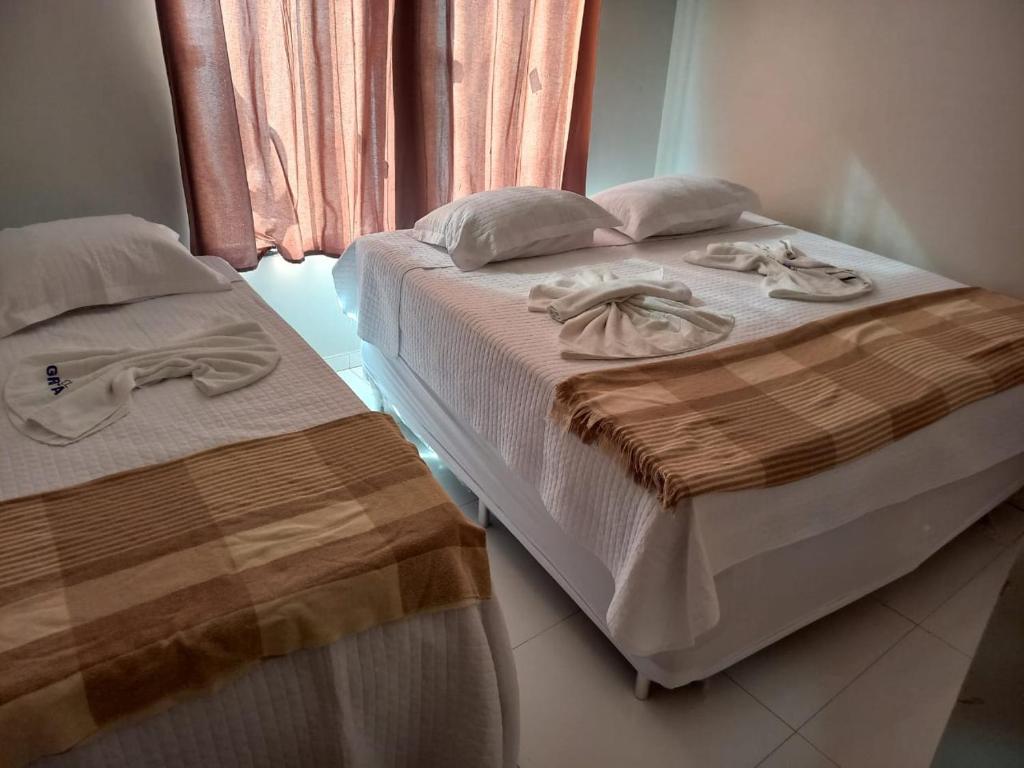 Ένα ή περισσότερα κρεβάτια σε δωμάτιο στο HOTEL SANTA FÉ