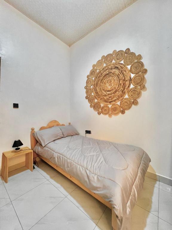 Un ou plusieurs lits dans un hébergement de l'établissement Rwanda Guest House Kanombe, Kigali