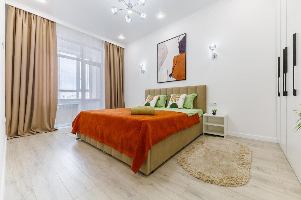 Ένα ή περισσότερα κρεβάτια σε δωμάτιο στο Golden apartments