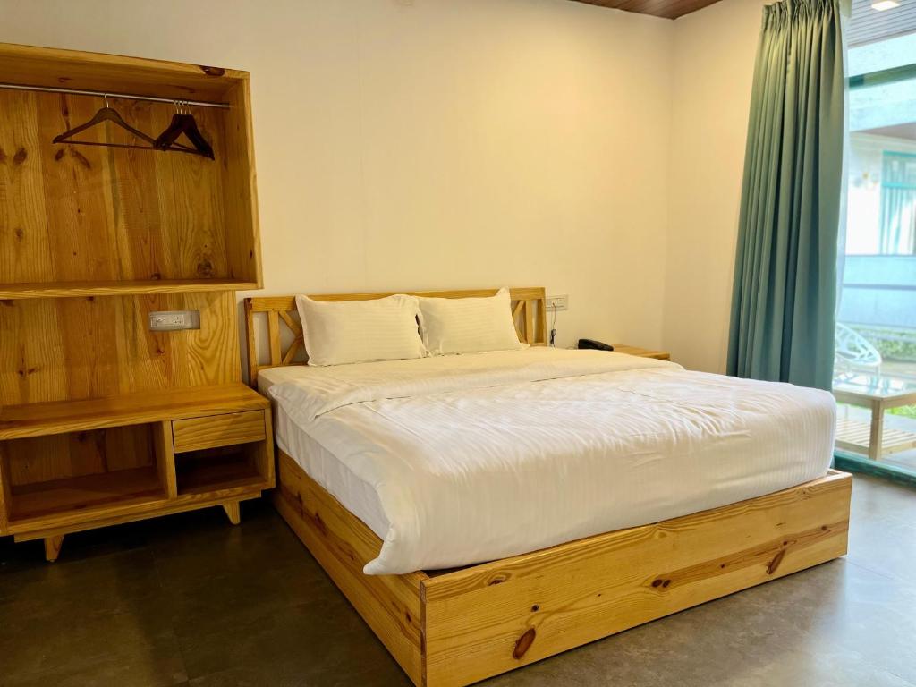 Postel nebo postele na pokoji v ubytování Magic Sand Beach Resort