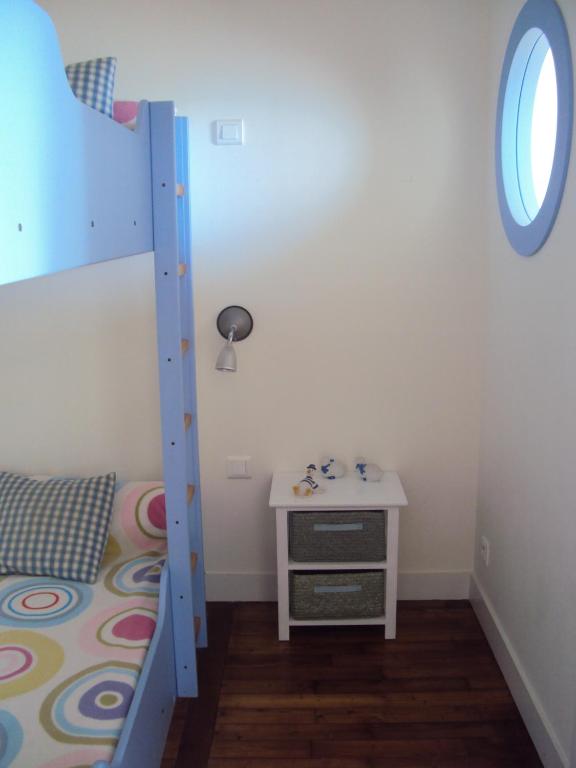 Postel nebo postele na pokoji v ubytování appartement fleurs