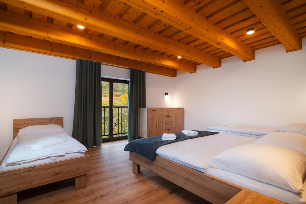 Postel nebo postele na pokoji v ubytování Villa Seraf