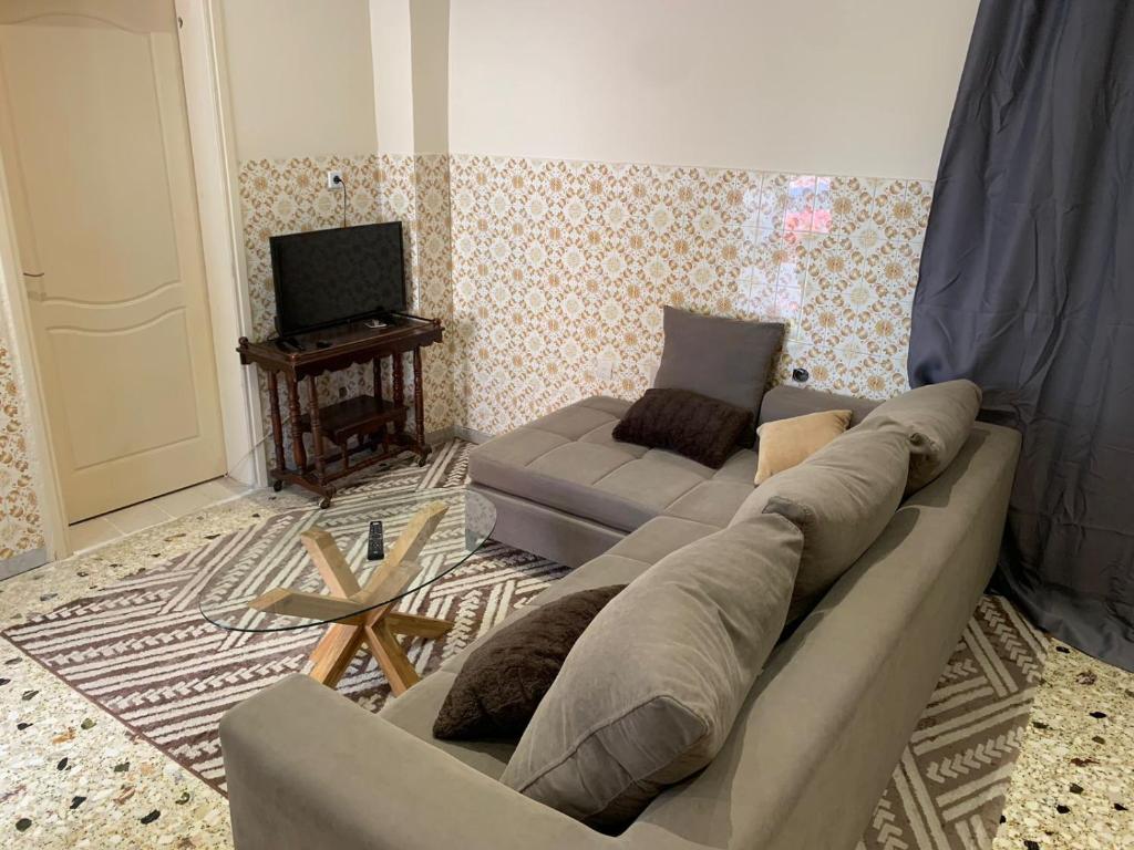 TV a/nebo společenská místnost v ubytování Rigas House