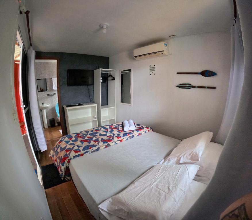 Postel nebo postele na pokoji v ubytování Container Hospedaria Paraty