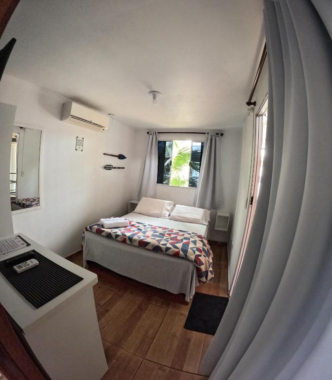 Postel nebo postele na pokoji v ubytování Container Hospedaria Paraty