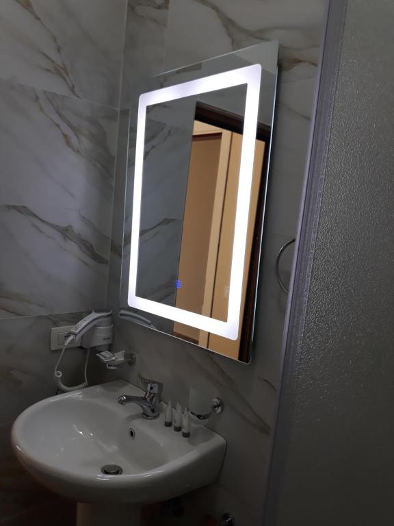 Koupelna v ubytování Qiqi Hotel