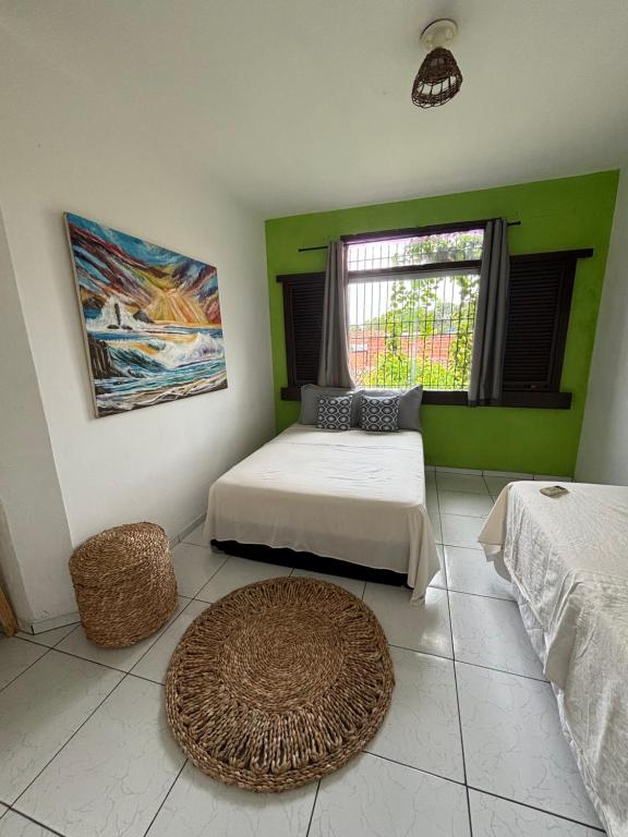 Postel nebo postele na pokoji v ubytování Parnaíba Hostel