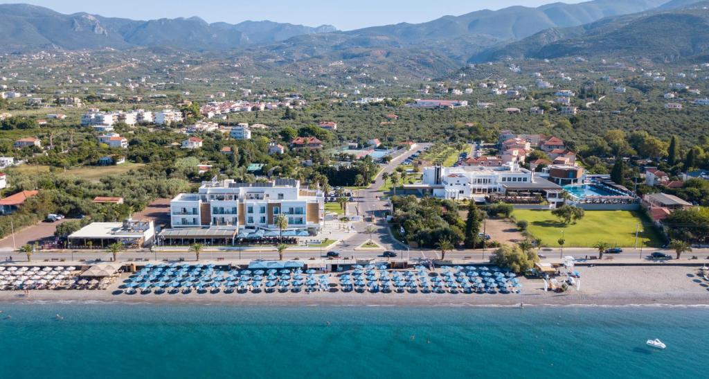 an aerial view of the resort and the water at Elite City Resort in Kalamata