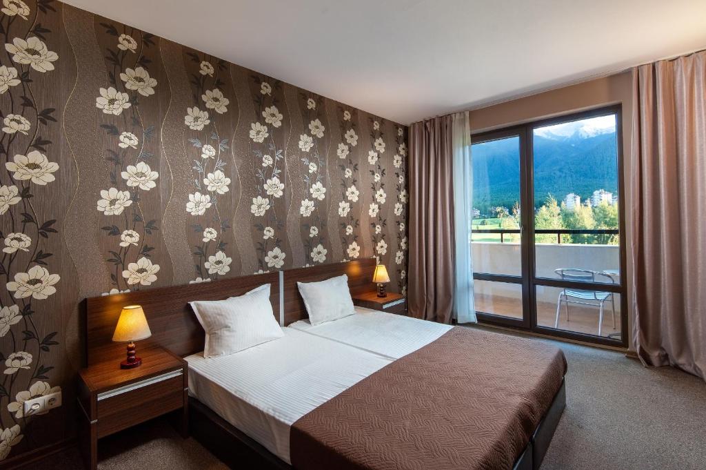 Postel nebo postele na pokoji v ubytování Terra Hotel