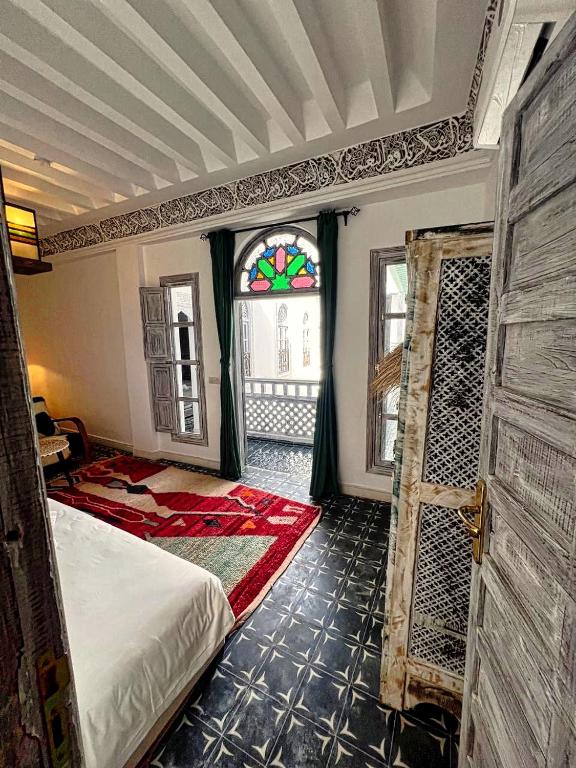 Postel nebo postele na pokoji v ubytování Riad dar darcom