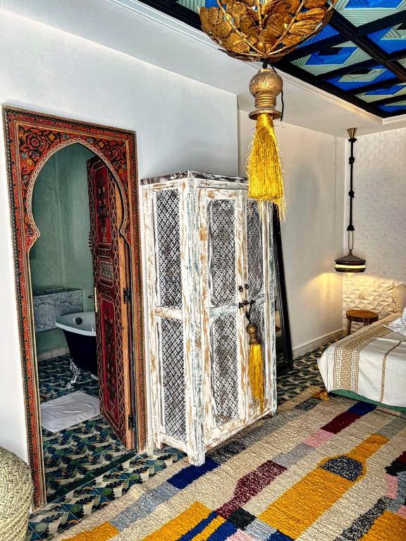 Postel nebo postele na pokoji v ubytování Riad dar darcom