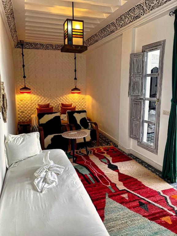Postel nebo postele na pokoji v ubytování Riad dar darcom