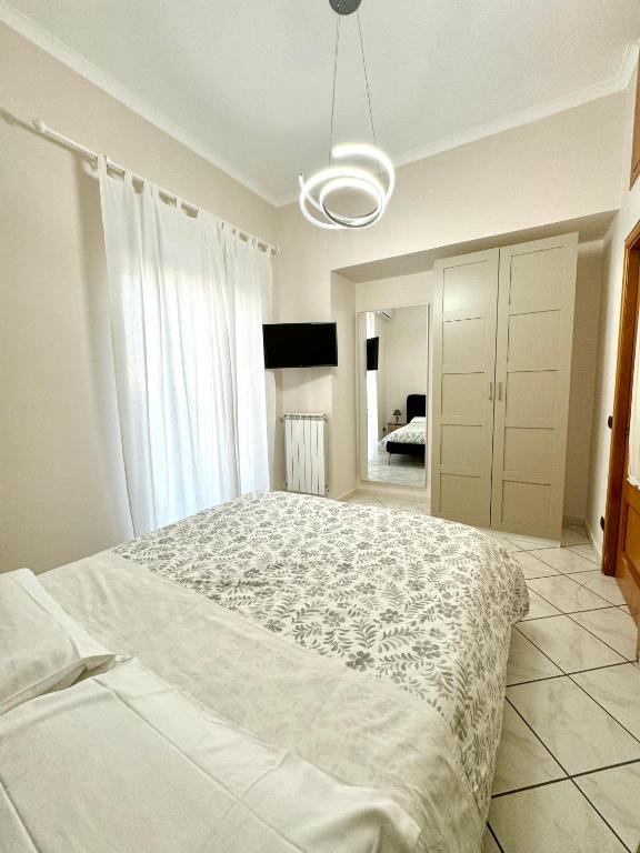 Postel nebo postele na pokoji v ubytování B&B Eracle