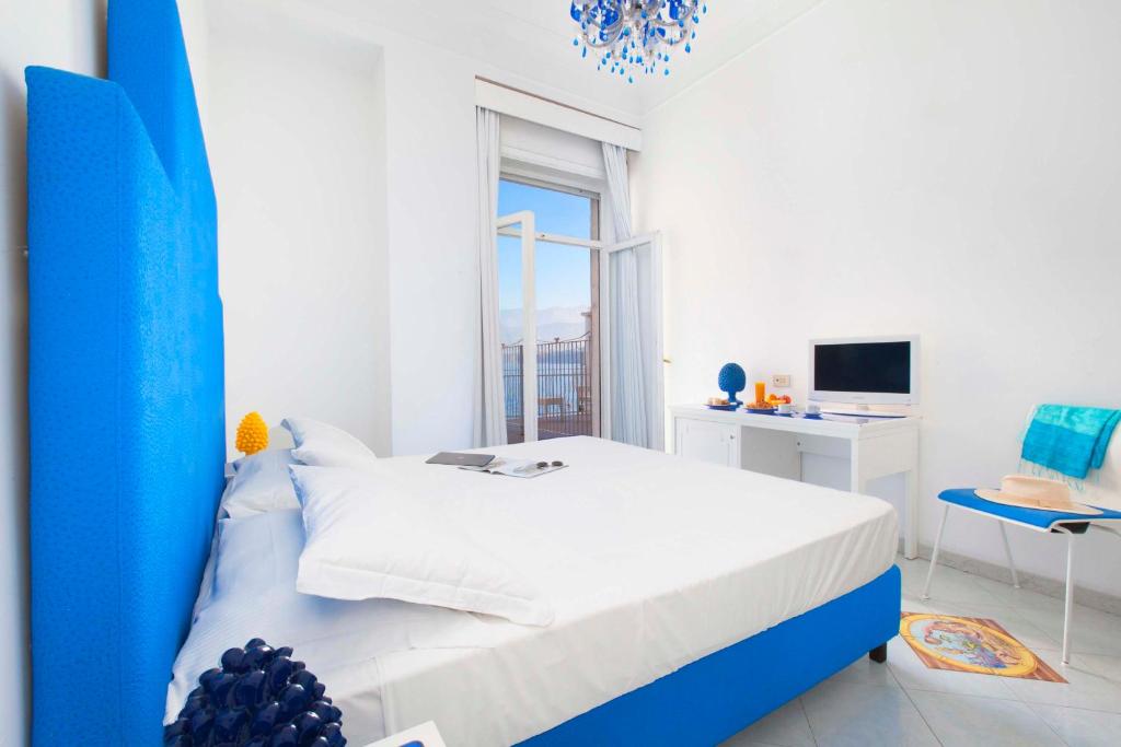Postel nebo postele na pokoji v ubytování Hotel Admiral