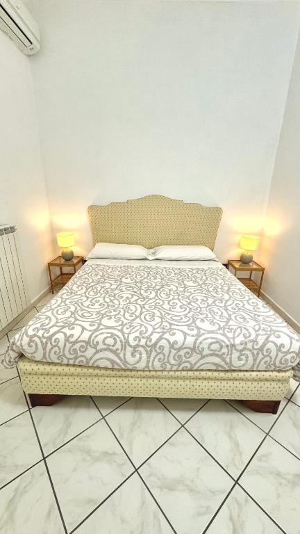 Postel nebo postele na pokoji v ubytování B&B Eracle