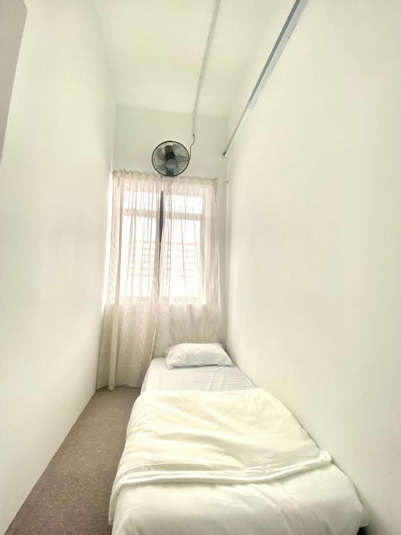 Postel nebo postele na pokoji v ubytování Bright Star Inn