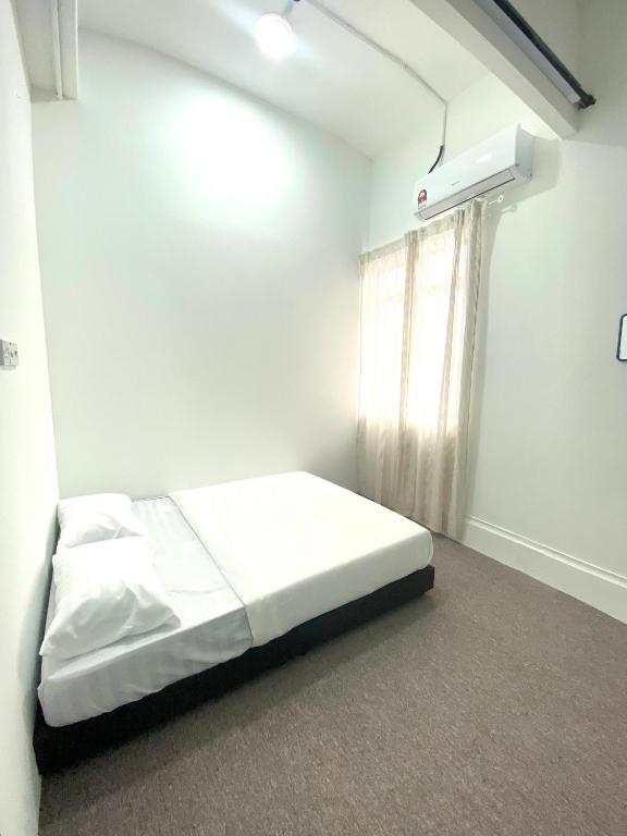 Postel nebo postele na pokoji v ubytování Bright Star Inn