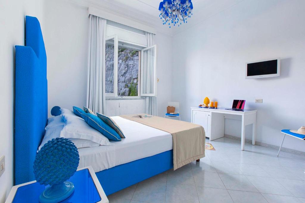 Postel nebo postele na pokoji v ubytování Hotel Admiral