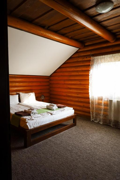 Postel nebo postele na pokoji v ubytování Recreation complex Volnogora