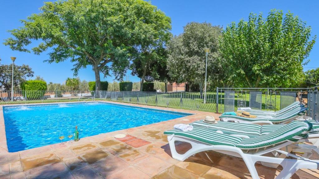 Piscine de l'établissement La Cabaña La Carlota by Ruralidays ou située à proximité