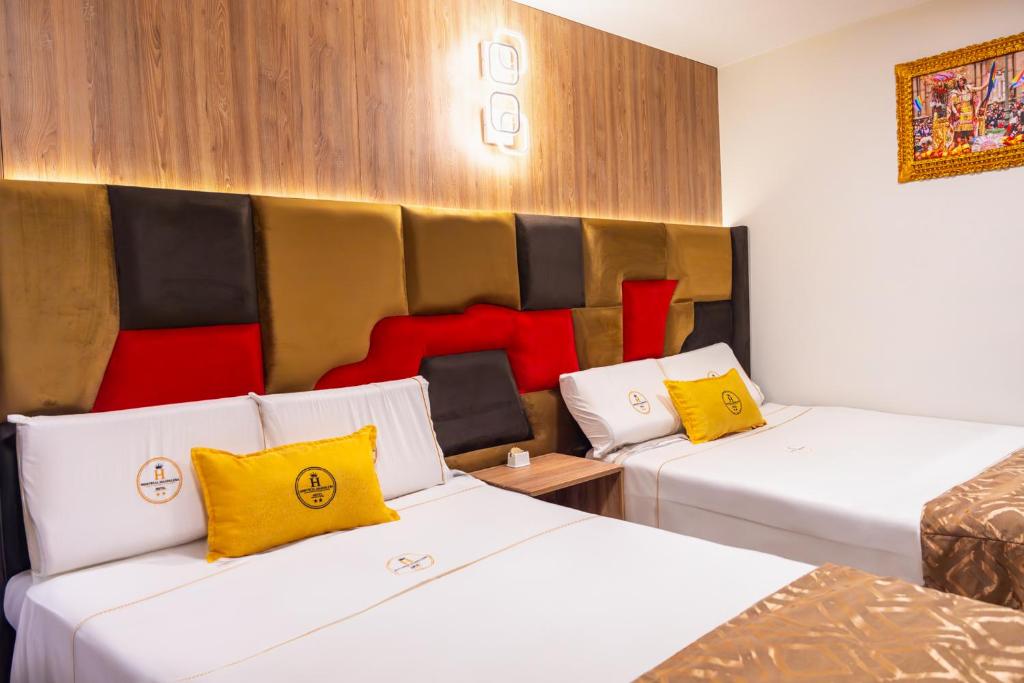 Postel nebo postele na pokoji v ubytování Montreal Magdalena Del Mar Hotel
