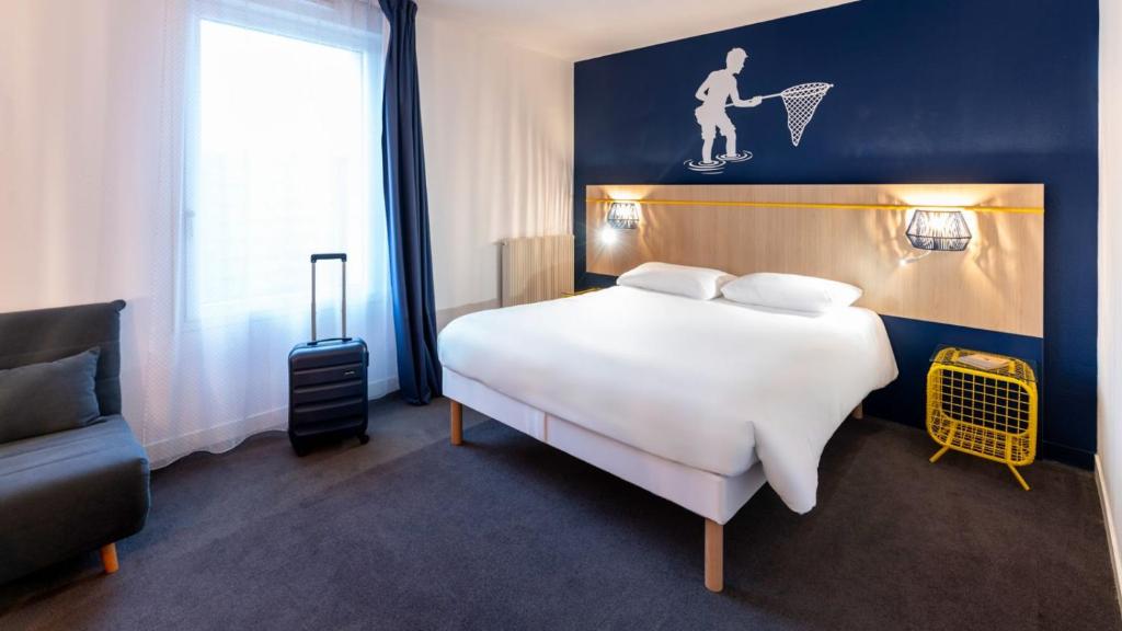 Postel nebo postele na pokoji v ubytování ibis Styles Morlaix